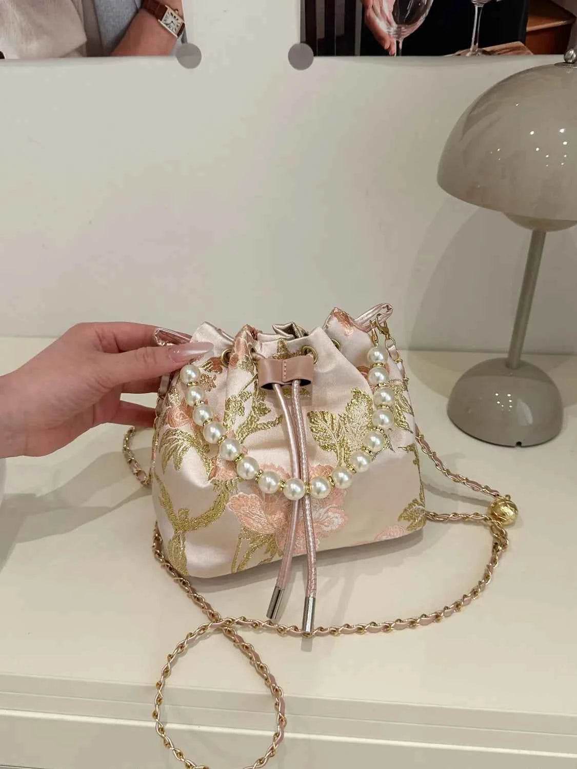 Drawstring Pearl Bucket Bag Dusty Pink One Size for a perfect OOTD – dress to impress outfits from Amexza