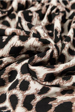 Cutout Back Leopard V-Neck Short Sleeve Mini Dress for a perfect OOTD – dress to impress outfits from Amexza