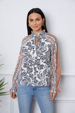 Tassel Tie Neck Printed Smocked Long Sleeve Blouse White for a perfect OOTD – dress to impress outfits from Amexza