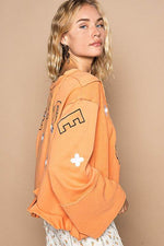 POL Peace Embroidered Exposed Seam Back Ruffle V-Neck Top - Amexza