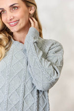 BiBi Cable Knit Round Neck Sweater for a perfect OOTD – dress to impress outfits from Amexza