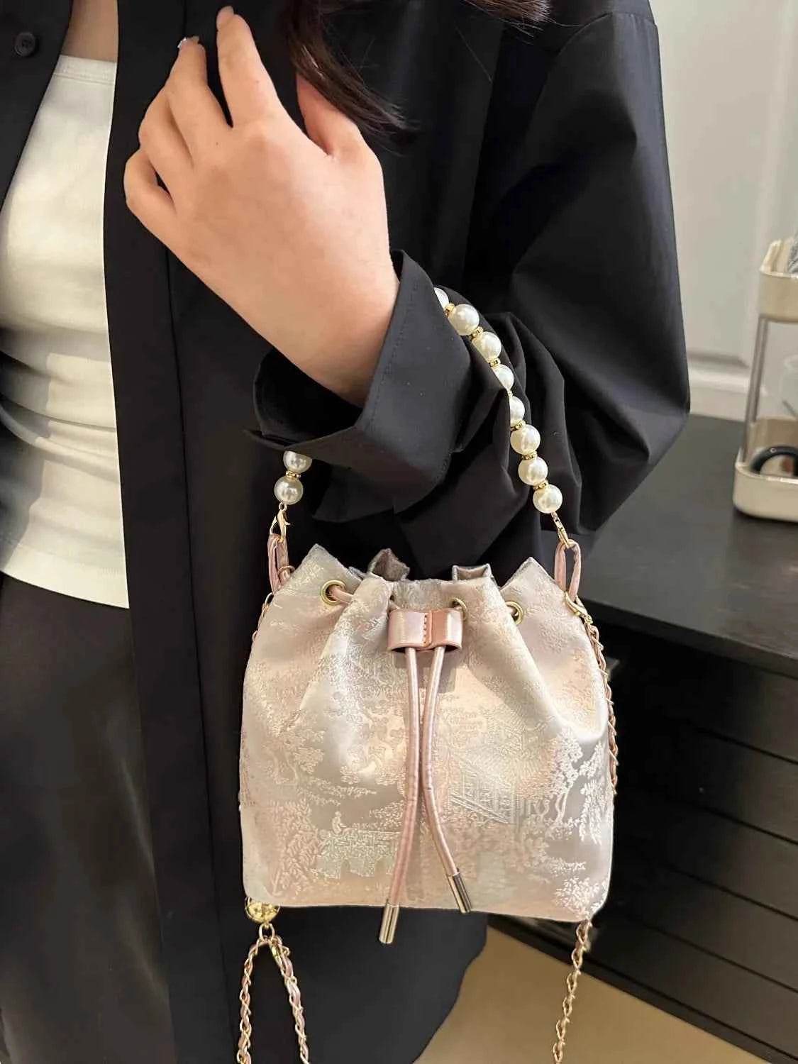 Drawstring Pearl Bucket Bag Blush Pink One Size for a perfect OOTD – dress to impress outfits from Amexza