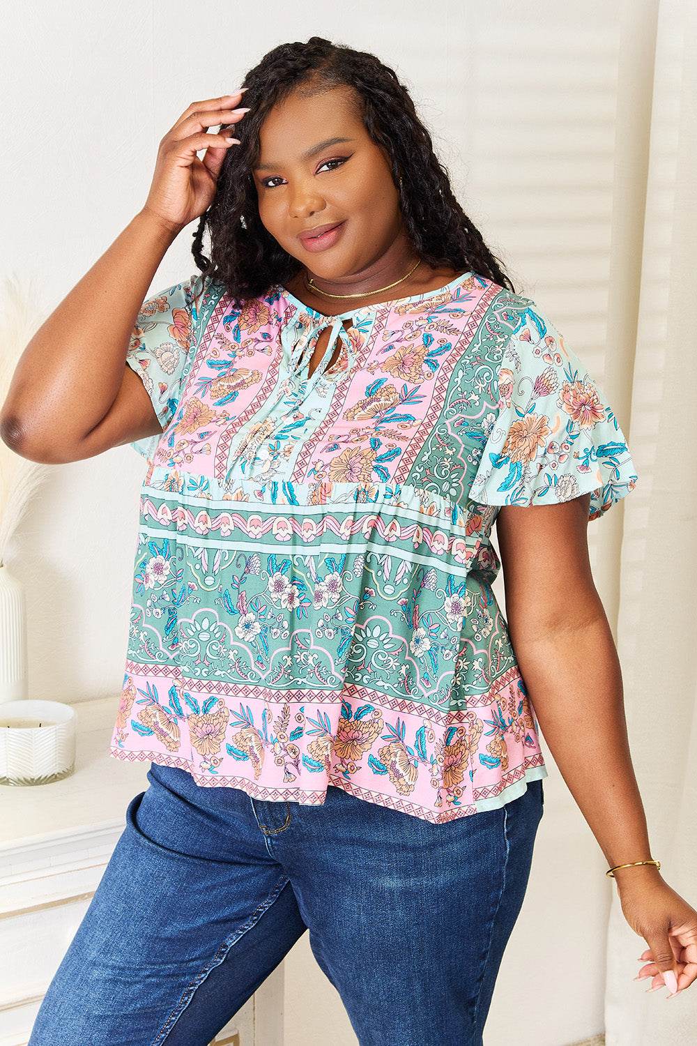 Perfee Floral Tie Neck Short Sleeve Blouse - Amexza