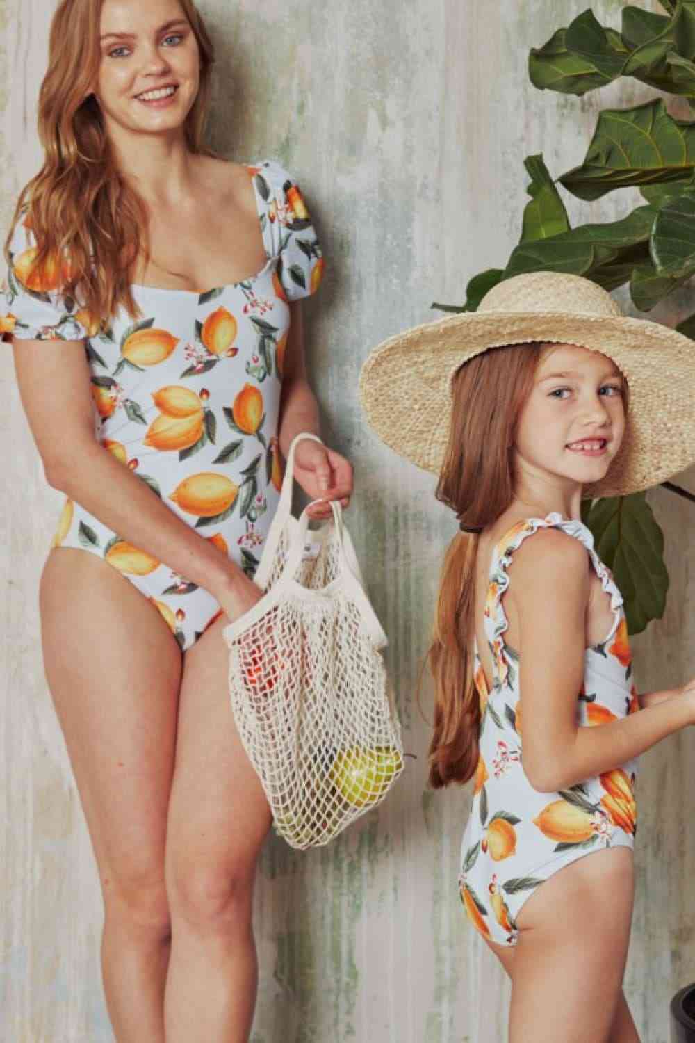 Marina West Swim Salty Air Puff Sleeve One-Piece in Citrus Orange for a perfect OOTD – dress to impress outfits from Amexza