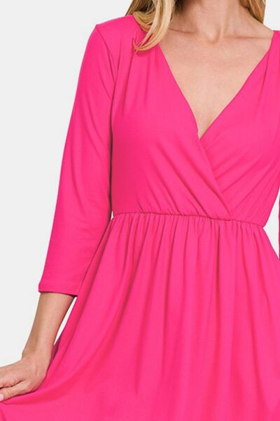 Zenana Three-Quarter Sleeve Surplice Dress with Pockets for a perfect OOTD – dress to impress outfits from Amexza