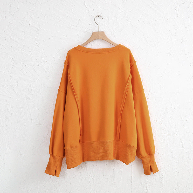 Exposed Seam High-Low Long Sleeve Sweatshirt