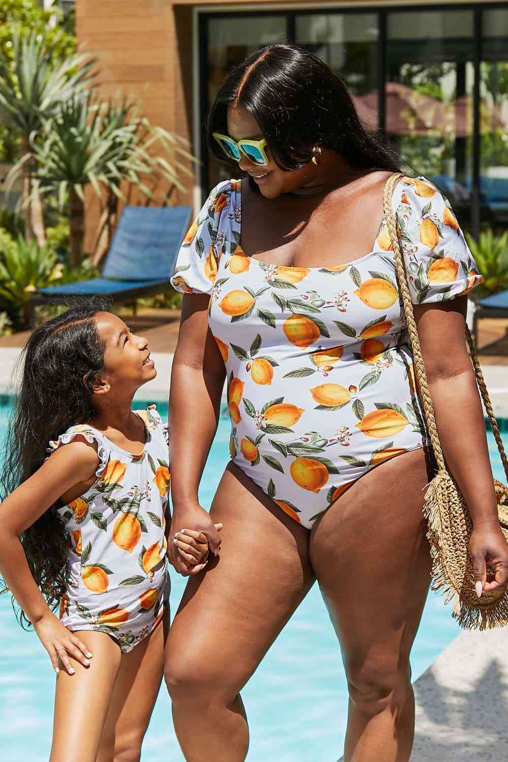 Marina West Swim Salty Air Puff Sleeve One-Piece in Citrus Orange for a perfect OOTD – dress to impress outfits from Amexza