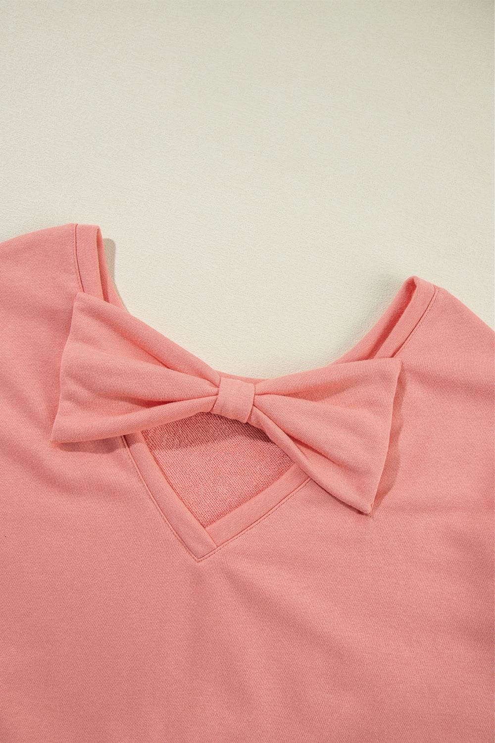 Bow Cutout Round Neck Long Sleeve Sweatshirt - Amexza