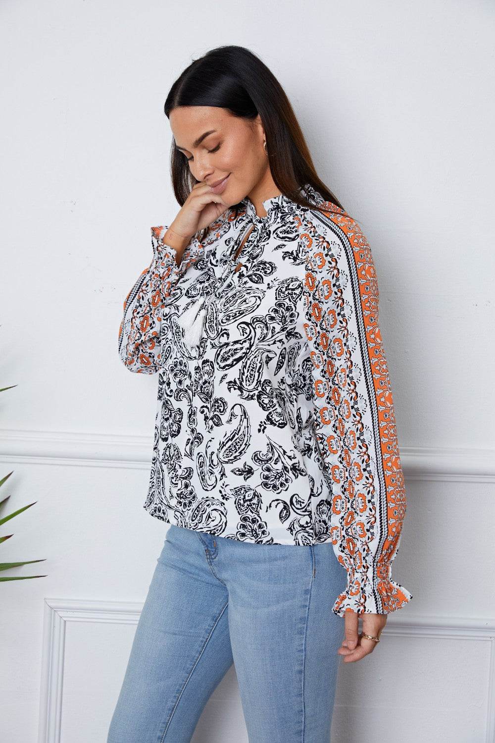 Tassel Tie Neck Printed Smocked Long Sleeve Blouse for a perfect OOTD – dress to impress outfits from Amexza