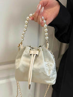 Drawstring Pearl Bucket Bag Silver One Size for a perfect OOTD – dress to impress outfits from Amexza