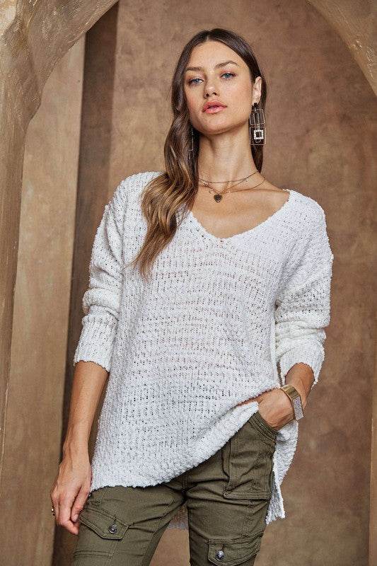 ADORA High-Low Side Slit V-Neck Sweater White for a perfect OOTD – dress to impress outfits from Amexza