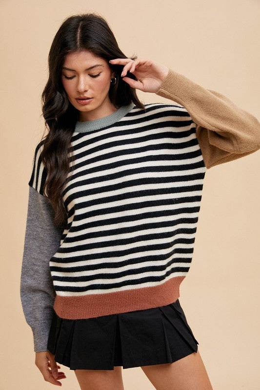 Annie Wear Striped Color Block Round Neck Sweater Ivory Black for a perfect OOTD – dress to impress outfits from Amexza