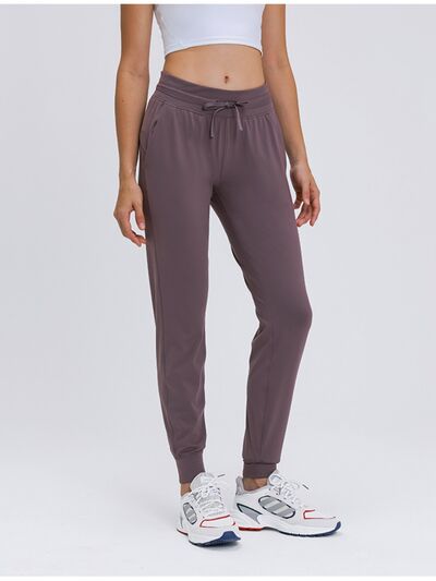 Millennia Double Take Tied Joggers with Pockets Dusty Pink for a perfect OOTD – dress to impress outfits from Amexza