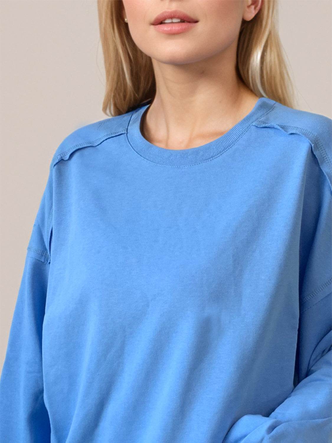 Exposed Seam Round Neck Long Sleeve Sweatshirt for a perfect OOTD – dress to impress outfits from Amexza