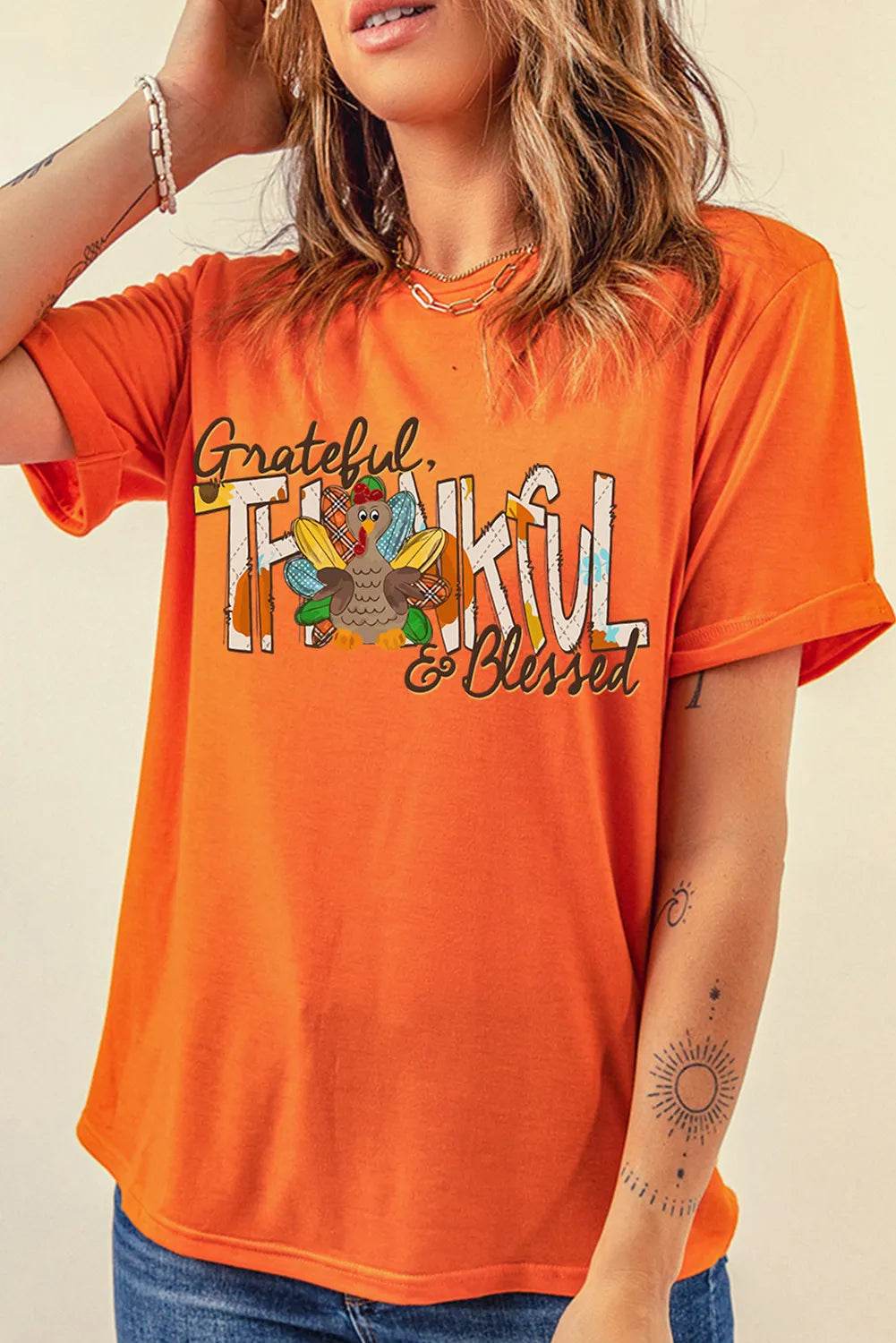 Graphic Round Neck Short Sleeve T-Shirt Orange for a perfect OOTD – dress to impress outfits from Amexza