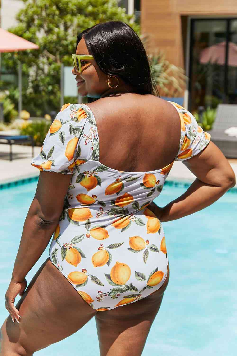 Marina West Swim Salty Air Puff Sleeve One-Piece in Citrus Orange for a perfect OOTD – dress to impress outfits from Amexza