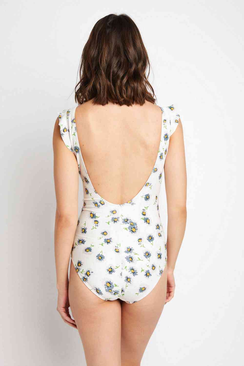 Marina West Swim Float On Ruffle Faux Wrap One-Piece in Daisy Cream for a perfect OOTD – dress to impress outfits from Amexza